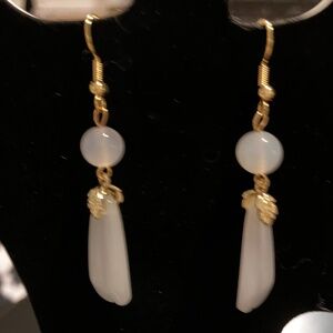 White alabaster earring with gold.